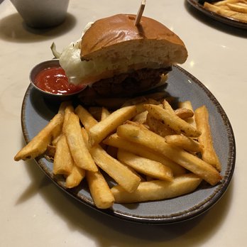 BC Kitchen - a burger and fries on a plate - Bars Near Me - Vancouver, British Columbia BC Kitchen - a burger and fries on a plate - Bars Near Me - Vancouver, British Columbia