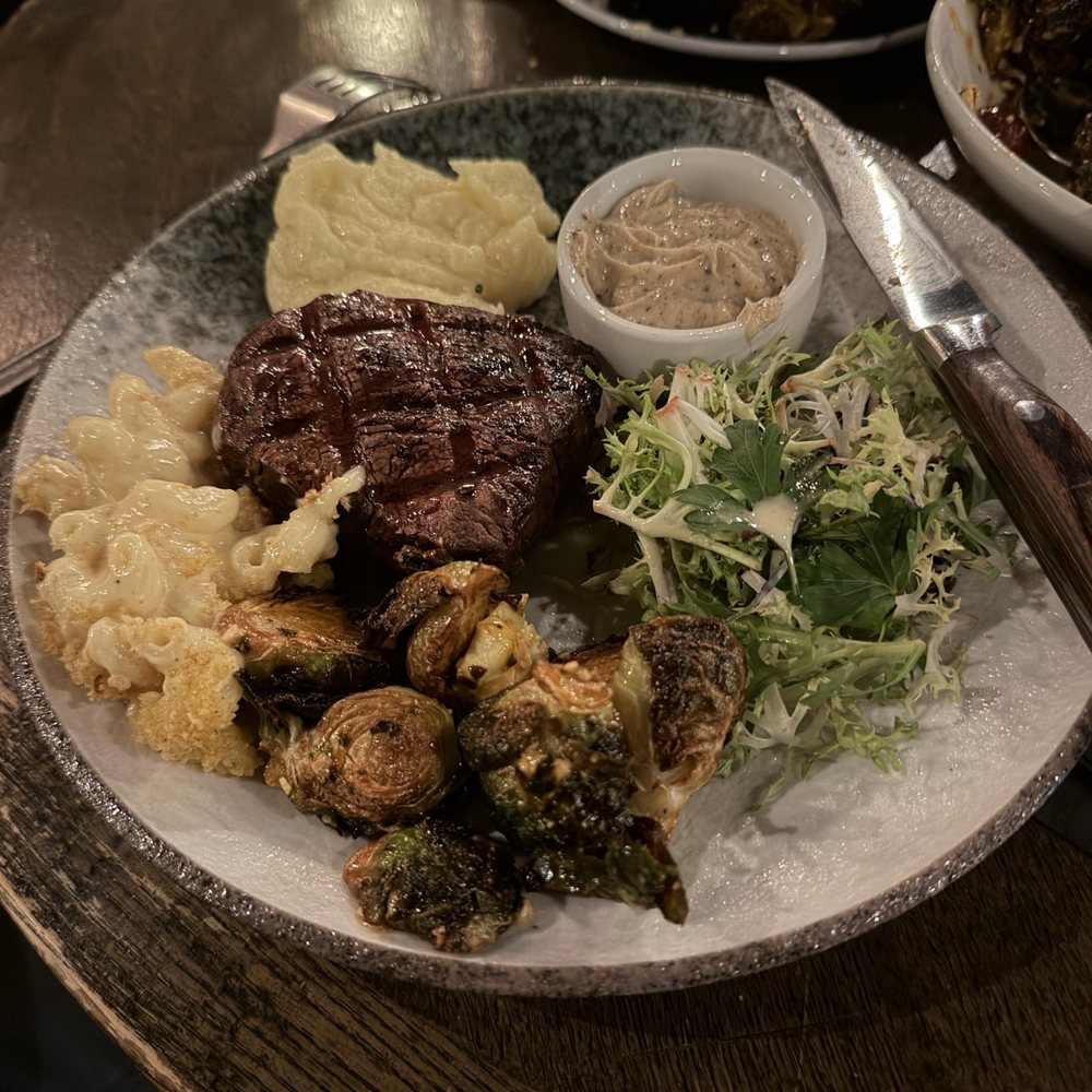 Cody's Restaurant - 7oz TENDERLOIN FILET with house butter and a sampling of shareable sides. - New American Near Me - New Braunfels, Texas Cody's Restaurant - 7oz TENDERLOIN FILET with house butter and a sampling of shareable sides. - New American Near Me - New Braunfels, Texas