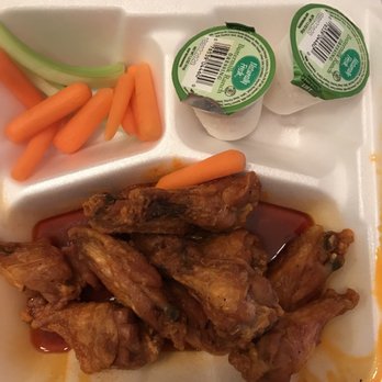 Sussie's Food To Go - Ten wing order in mild oily looking sauce - Chicken Wings Near Me - Monroe, Georgia