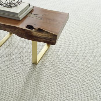 Banowetz Floor Covering - a coffee table with a book on it - Flooring Near Me - Dubuque, Iowa Banowetz Floor Covering - a coffee table with a book on it - Flooring Near Me - Dubuque, Iowa