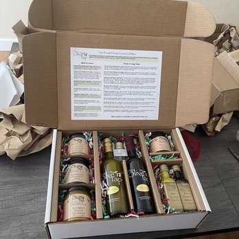 The Olive Tap - The Foodie Frenzy Gourmet Gift Box in holiday wrapping - Olive Oil Near Me - Manitou Springs, Colorado The Olive Tap - The Foodie Frenzy Gourmet Gift Box in holiday wrapping - Olive Oil Near Me - Manitou Springs, Colorado