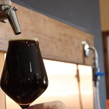 South 40 Brewing - a hand holding a glass of beer - Breweries Near Me - Edison, New Jersey South 40 Brewing - a hand holding a glass of beer - Breweries Near Me - Edison, New Jersey