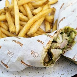 Tasty medium spiced chicken wrap included yummy fries