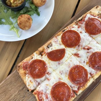 The Standard - Goat cheese balls and pepperoni flat bread - Burgers Near Me - Delray Beach, Florida The Standard - Goat cheese balls and pepperoni flat bread - Burgers Near Me - Delray Beach, Florida