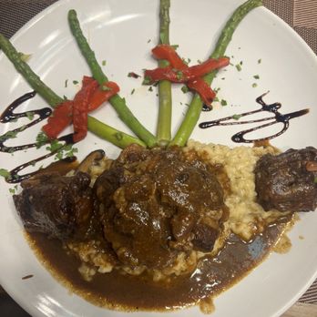 D'Maria's Deli & Bakery - Oxtail with mushroom risotto and asparagus. - Bakeries Near Me - Palm Coast, Florida D'Maria's Deli & Bakery - Oxtail with mushroom risotto and asparagus. - Bakeries Near Me - Palm Coast, Florida