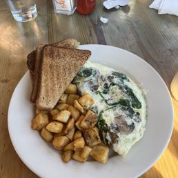 Egg white omelette with hash browns and whole wheat toast