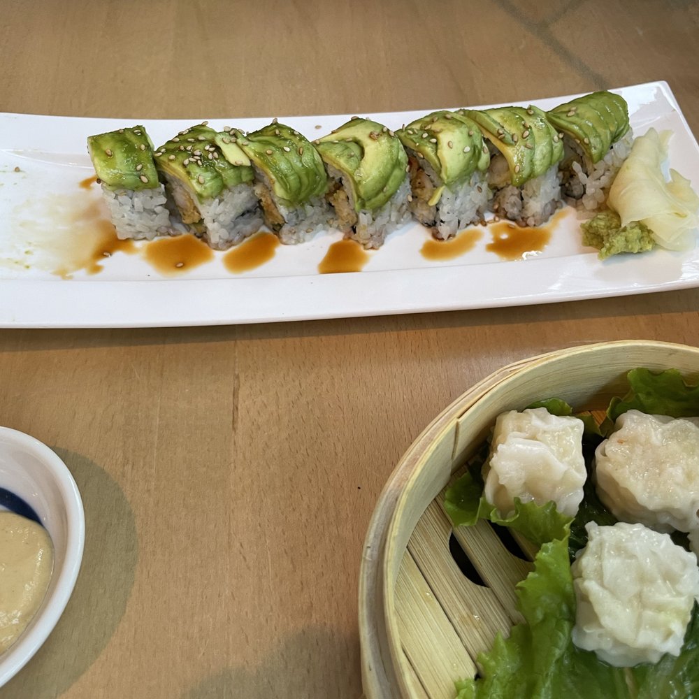 Possibly the Caterpillar Roll on top, steamed shrimp dumplings on the bottom? (it's been a couple of months) Possibly the Caterpillar Roll on top, steamed shrimp dumplings on the bottom? (it's been a couple of months)