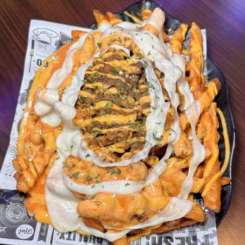 Luv Dduk - bulgogi fries with their house made sauce and cheese - Korean Near Me - Cerritos, California Luv Dduk - bulgogi fries with their house made sauce and cheese - Korean Near Me - Cerritos, California