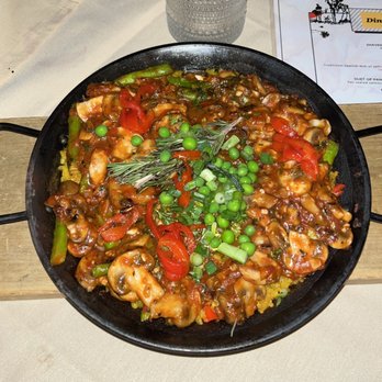 Olé Tapas Bar & Kitchen - Mushroom & Roasted Garlic Paella Familia - Spanish Near Me - Long Beach, California