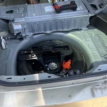 Hybrid2Go - Old battery being taken out. - Hybrid Car Repair Near Me Hybrid2Go - Old battery being taken out. - Hybrid Car Repair Near Me