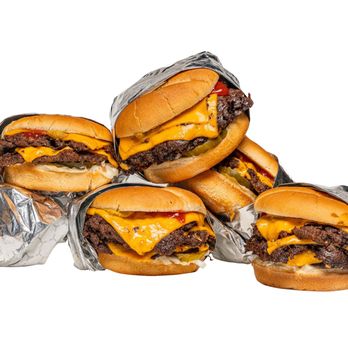 MrBeast Burger - a pile of cheeseburgers - Food Delivery Services Near Me - Langhorne, Pennsylvania