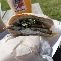 El Azteca Mexican - Torta with chicken, lettuce, red cabbage on an incredible crispy torta