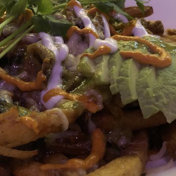 Union 50 - Poutine chilaquiles! Love this dish made from typical dishes from my north and south of the border neighbors! - Gastropubs Near Me - Indianapolis, Indiana