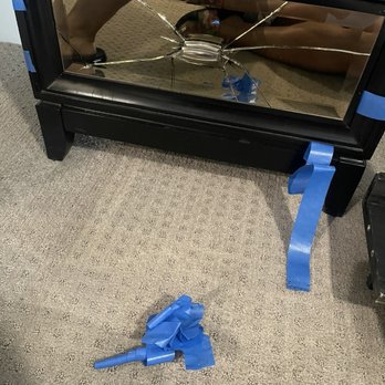 Nevada Movers - Damaged nightstand mirror - Movers Near Me