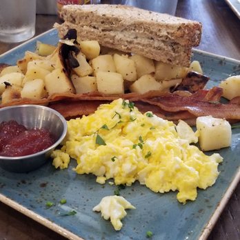 First Watch - 2 scrambled eggs, bacon, homestyle potatoes and toast. - Breakfast & Brunch Near Me - Sunrise, Florida