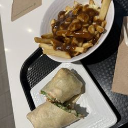 Chicken Caesar wrap and poutine