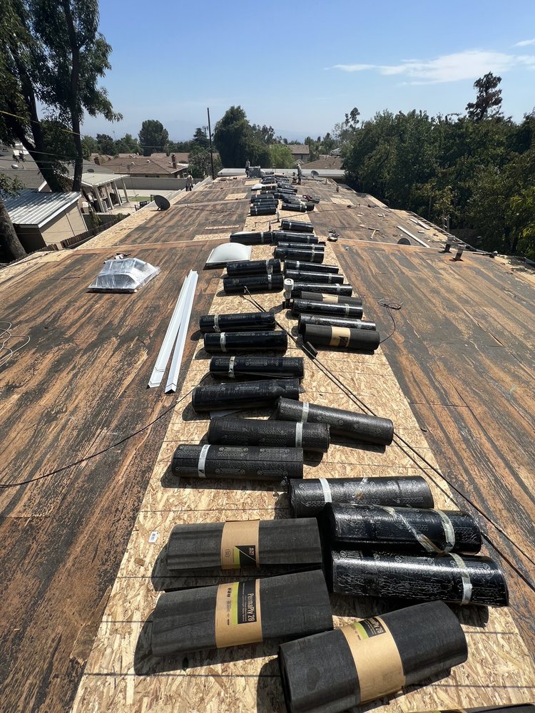 Slide of J P Roofing