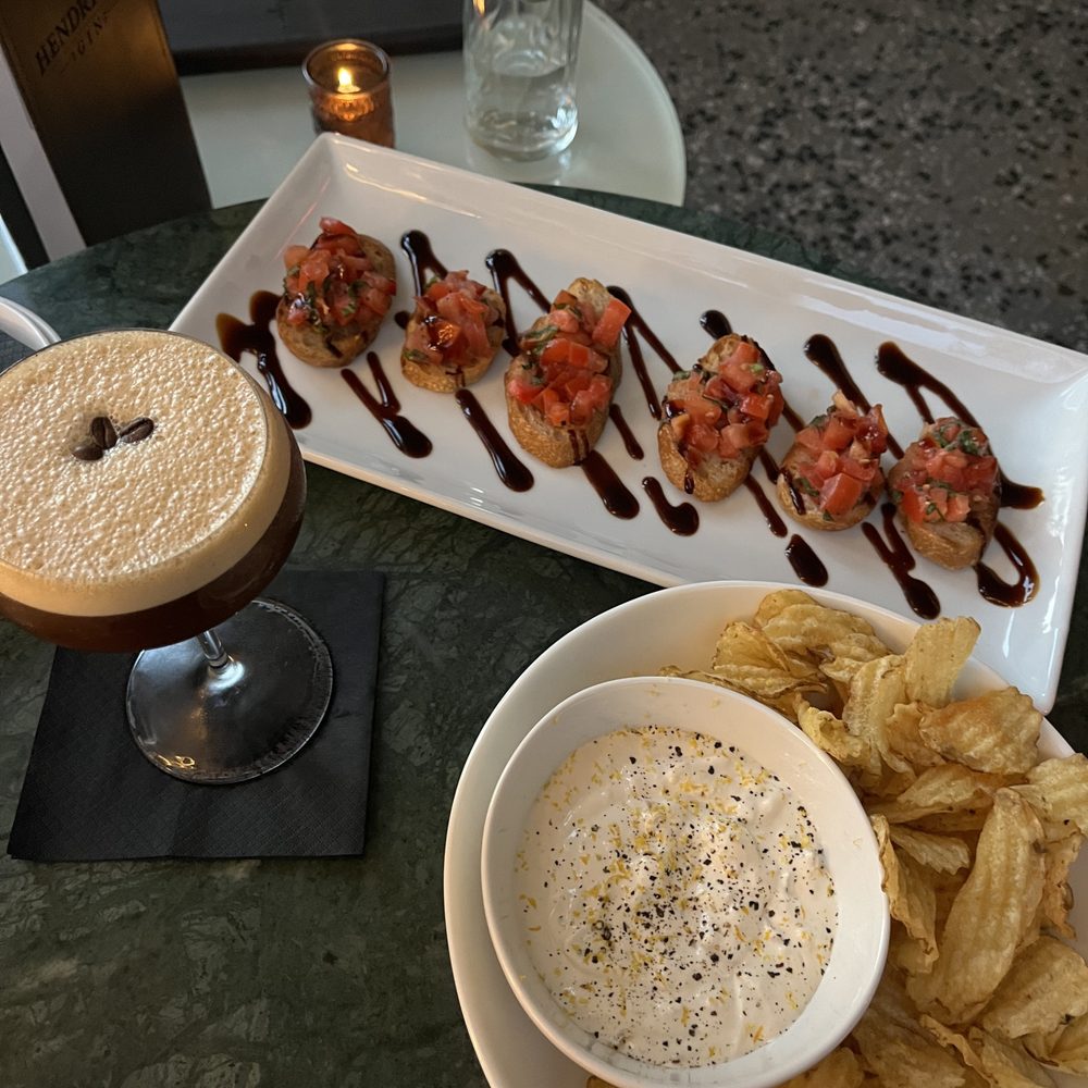 Espress martini, chips and dip, bruschetta