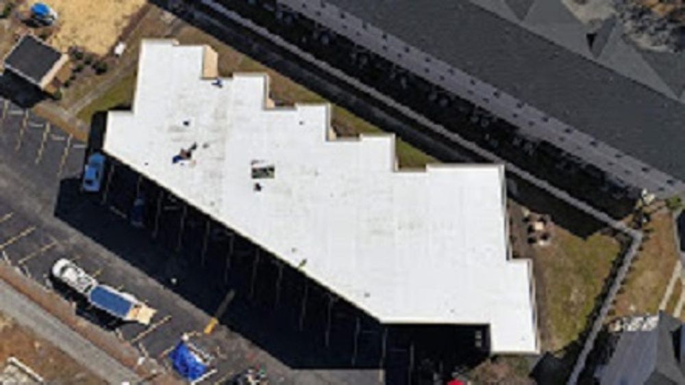 Slide of PMI Roofing & Renovations