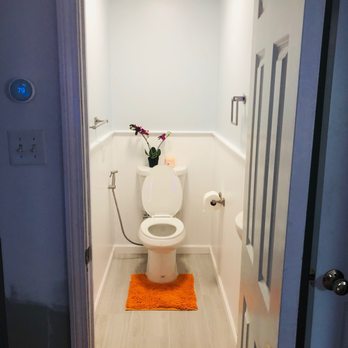 Superior Kitchen and Bath - a toilet in a small bathroom - General Contractors Near Me - Cromwell, Connecticut