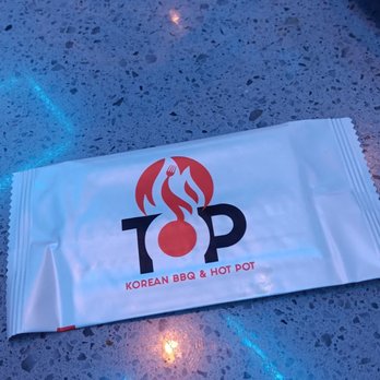 Top Korean BBQ & Hot Pot - Wet wipe they give you at the end of dining - Barbeque Near Me - Morrow, Georgia