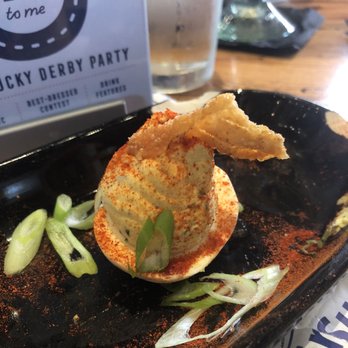 The Rustic - Deviled egg with a chicken cracklin' on top...genius!!! - Bars Near Me - Houston, Texas The Rustic - Deviled egg with a chicken cracklin' on top...genius!!! - Bars Near Me - Houston, Texas