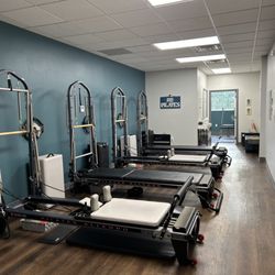 RB Pilates - RB Pilates Class Studio with 4 Reformer/Tower Pilates machines.