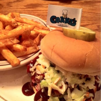 Corky's BBQ - Delicious pork sandwich, served with coleslaw on the top. - Barbeque Near Me - Cordova, Tennessee