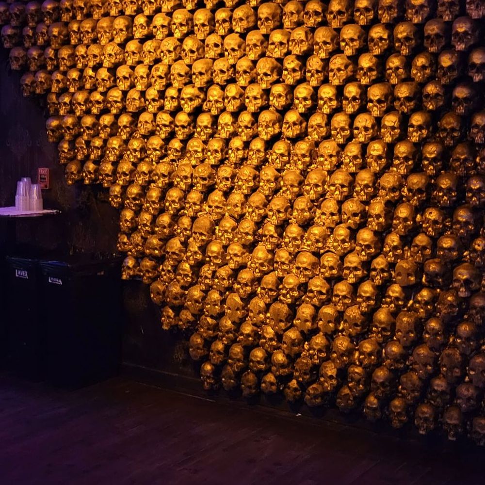 McQueens Social Lounge - The Skull wall is very cool, but the lower section is looking a little worn & shabby. - Bars Near Me - Orlando, Florida McQueens Social Lounge - The Skull wall is very cool, but the lower section is looking a little worn & shabby. - Bars Near Me - Orlando, Florida