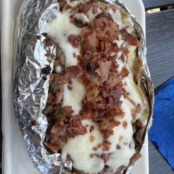 Belly’s On The Brazos - Steak stuffed potato - New American Near Me - Freeport, Texas Belly’s On The Brazos - Steak stuffed potato - New American Near Me - Freeport, Texas
