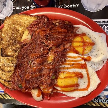 Sykes - Corned beef and hash with wheat toast and sunny side up eggs - Coffee & Tea Near Me - Kalispell, Montana