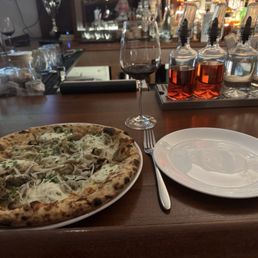 Happy Hour at bar: wild mushroom pizza (I added black truffle oil) and Cabernet! Happy Hour at bar: wild mushroom pizza (I added black truffle oil) and Cabernet!