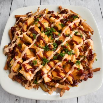 Southern classic kitchens - a plate of loaded fries - Food Trucks Near Me Southern classic kitchens - a plate of loaded fries - Food Trucks Near Me