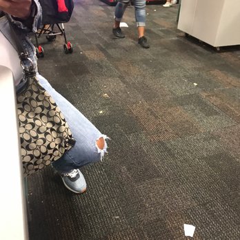 Chuck E Cheese's - a woman sitting on a bench - Pizza Near Me - Carson, California