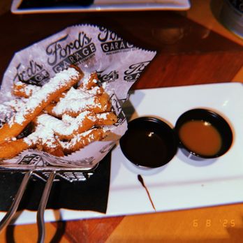 Ford's Garage Avon - Funnel fries with Carmel and chocolate dipping sauce - Bars Near Me - Avon, Indiana
