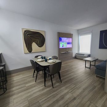 Kompose Hotel - Dining area, living area with pull out sofa bed - Hotels Near Me - Kissimmee, Florida