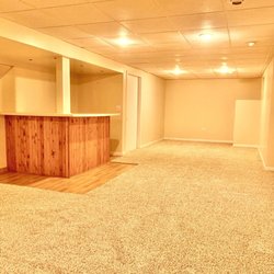 Apartment Solutions - Single Family Home managed by Apartment Solutions - Finished basement with bar