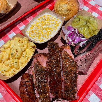 Terry Black's Barbecue - Jalapeño cheddar sausage, pork ribs, brisket, mac & cheese, cornbread, and creamed corn - Barbeque Near Me - Austin, Texas