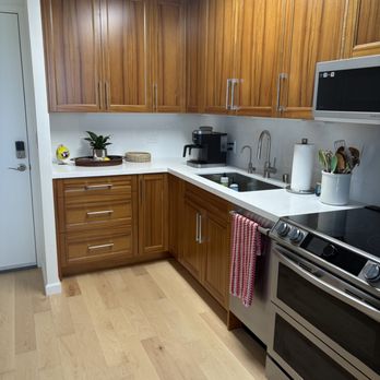 Eco Floors & Cabinets - Lots more cabinet space turning our galley kitchen into a L-layout. - Flooring Near Me - Aiea, Hawaii Eco Floors & Cabinets - Lots more cabinet space turning our galley kitchen into a L-layout. - Flooring Near Me - Aiea, Hawaii