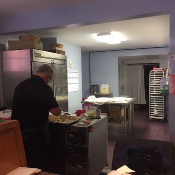 Sweet Temptations Du Jour - a man preparing food - Bakeries Near Me - Buffalo, New York