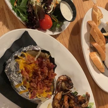 Down Under Restaurant - Blackened Shrimp with a loaded baked potato and side salad. Excellent - Seafood Near Me - Fernandina Beach, Florida