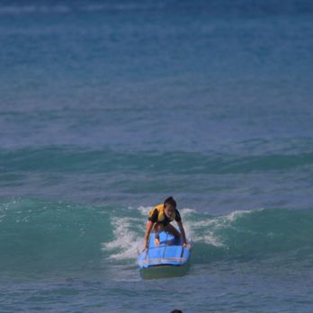 Big Wave Dave - Attempting to stand - Paddleboarding Near Me - Honolulu, Hawaii