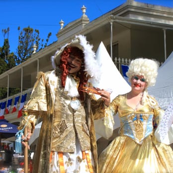 Paris to Provence - Roving entertainers standing at the front of Como House - Festivals Near Me - South Yarra, VIC