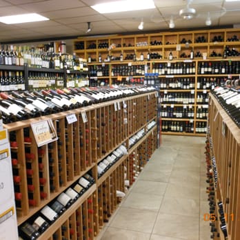 Casa Del Vino - rows of bottles of wine on shelves - Beer, Wine & Spirits Near Me - Trenton, Michigan