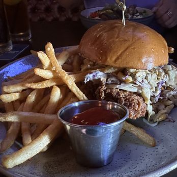 Wild Goose Tavern - HH Fried Chicken Sandwich ($13) - habanero marinated crispy chicken with hot honey, habanero ranch, and avocado corn slaw. - New American Near Me - Costa Mesa, California Wild Goose Tavern - HH Fried Chicken Sandwich ($13) - habanero marinated crispy chicken with hot honey, habanero ranch, and avocado corn slaw. - New American Near Me - Costa Mesa, California