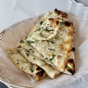 Darbar India - "Cheese, Garlic Naan" (clay oven bread stuffed with cheese, fresh garlic and coriander) - Indian Near Me - Branford, Connecticut Darbar India - "Cheese, Garlic Naan" (clay oven bread stuffed with cheese, fresh garlic and coriander) - Indian Near Me - Branford, Connecticut