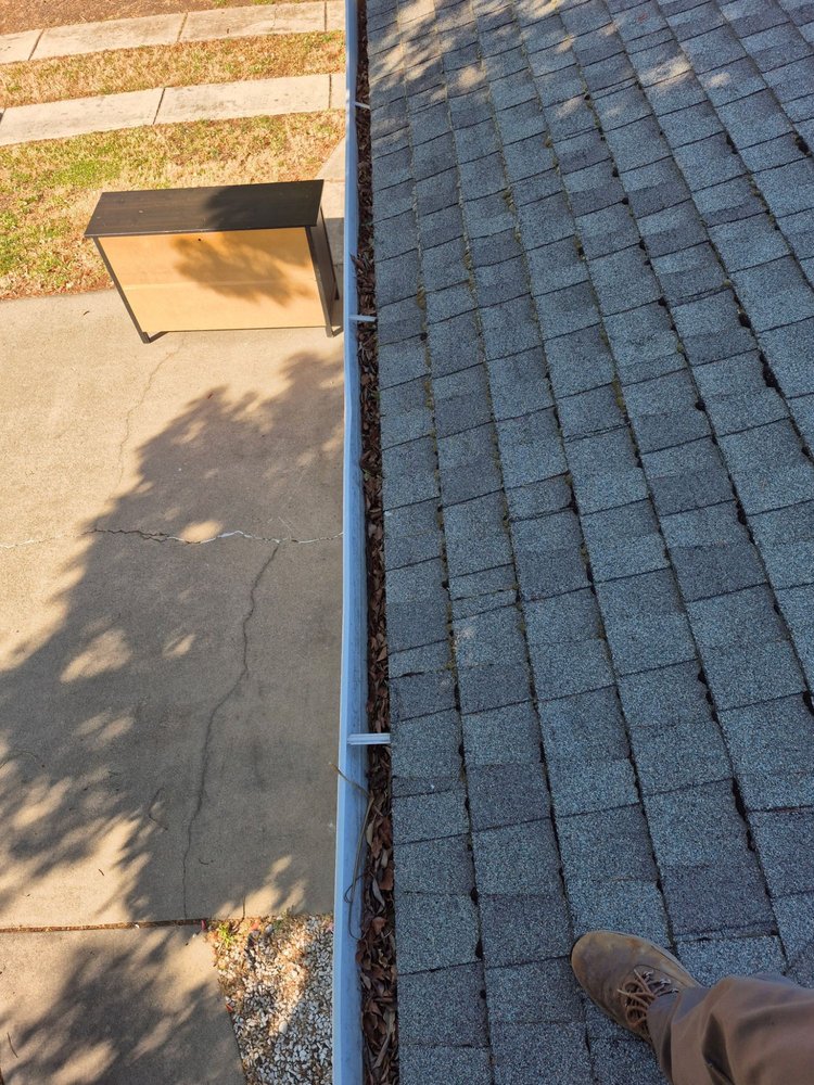 Slide of Cleaning Gutters Service