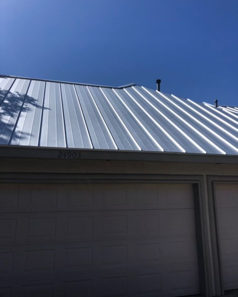 Slide of Roland's Roofing