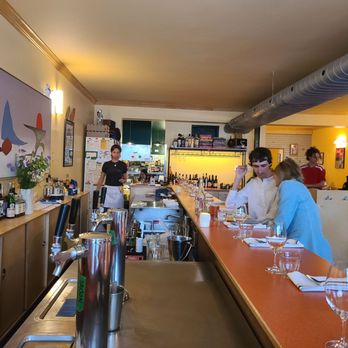Pichai - people at the bar of a restaurant - Thai Near Me - Montreal, Quebec
