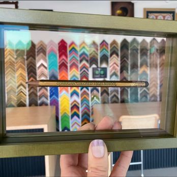 Ballard's Artwork Framing - "plexi float" frame for an antique pencil.  Green frame milled and finished locally in Los Angeles - Framing Near Me - Pasadena, California